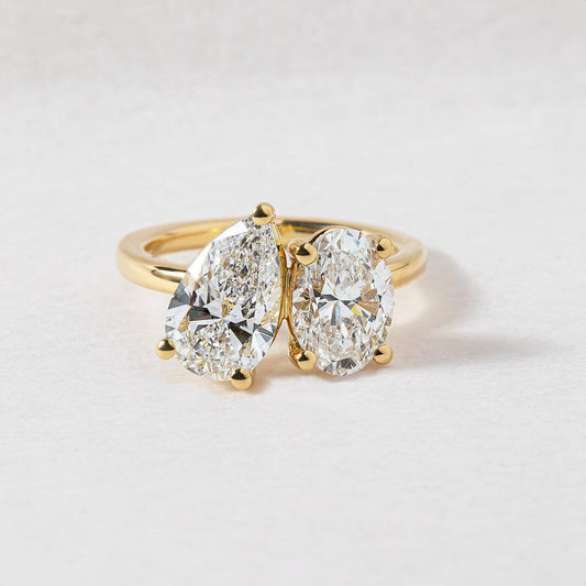 2ct Pear & Oval Toi Et Moi Lab Grown Diamond Ring Premium diamond gold ring, crafted with intricate details and a refined finish. Classic gold band enhanced with shimmering diamonds, suitable for all occasions. YouTube Amazon Facebook Weather Google Gmail Wordless WhatsApp Web Translate News blog post ring ceremony Article Life Money 2025 design Ring Ceremony Diamond Shape Diamond Ring Surat Diamond India Market Diamond Ring for Her Diamond Ring for Men Diamond Ring Women Engagement Ring Finger For Her 