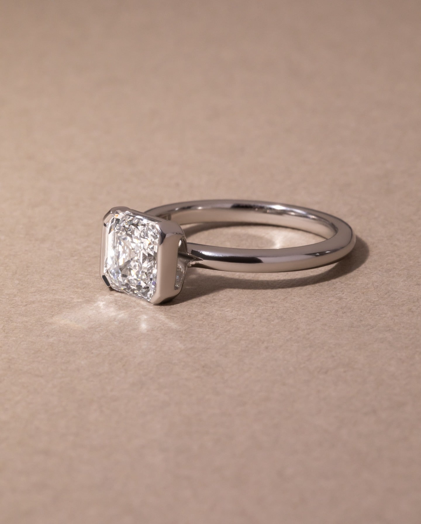 2ct Square Emerald Half Bezel Lab Grown Diamond Ring  Brides and grooms alike can celebrate their love story with this sophisticated engagement ring, diamond ring, gold engagement ring, luxury bridal jewelry, wedding accessories YouTube Amazon Facebook Weather Google Gmail Wordless WhatsApp Web Translate News blog post ring ceremony Article Life Money 2025 design Ring Ceremony Diamond Shape Diamond Ring Surat Diamond India Market Diamond Ring for Her Diamond Ring for Men Diamond Ring Women Engagement Ring 