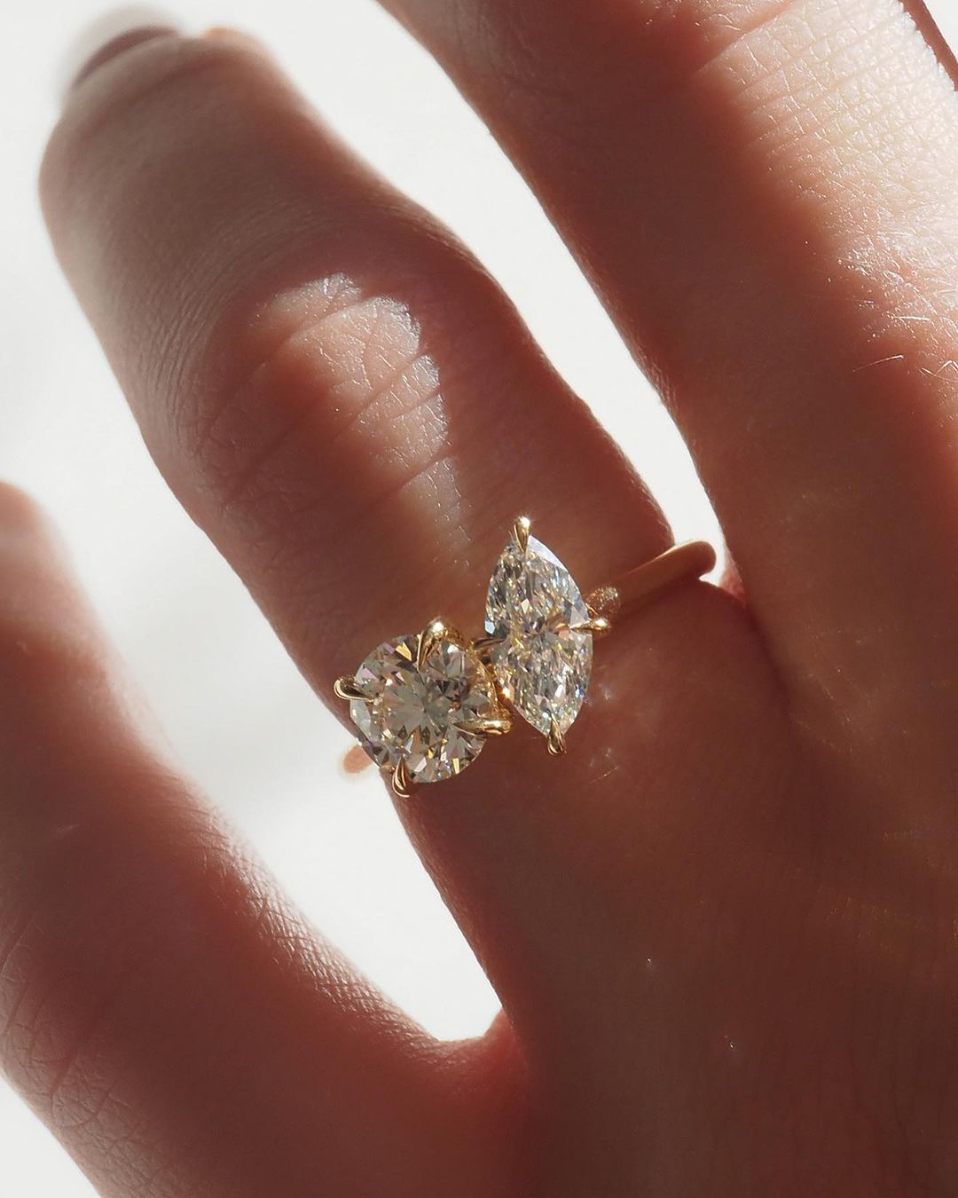 2tcw Round & Marquise Cut Toi t Moi Lab Grown Diamond Ring Close-up of a hand adorned with a sparkling  diamond ring on a sleek gold band, featuring a modern and elegant design. The ring is perfect for engagement, wedding, or luxury jewelry collections. YouTube Amazon Facebook Weather Google Gmail Wordless WhatsApp Web Translate News blog post ring ceremony Article Life Money 2025 design Ring Ceremony Diamond Shape Diamond Ring Surat Diamond India Market Diamond Ring for Her Diamond Ring for Men Diamond 