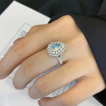 3.20 tcw pear lab grown diamond ring cathedral triple halo engagement wedding ring IGI certified bridal jewelry luxury elegant timeless design