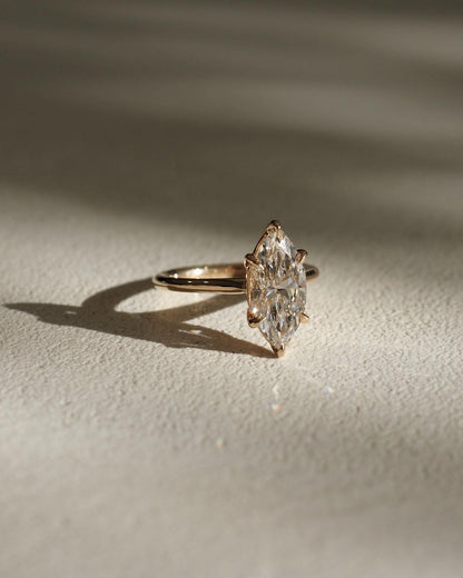 3ct Marquise Six Claw Lab Grown Diamond Ring  Designed to dazzle, the diamond’s brilliance makes it an ideal choice for engagements, weddings, anniversaries, or any special occasion. YouTube Amazon Facebook Weather Google Gmail Wordless WhatsApp Web Translate News blog post ring ceremony Article Life Money 2025 design Ring Ceremony Diamond Shape Diamond Ring Surat Diamond India Market Diamond Ring for Her Diamond Ring for Men Diamond Ring Women Engagement Ring Finger For Her Finger Ring Gold Ring Bluestone 