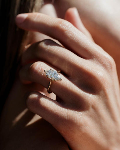 3ct Marquise Six Claw Lab Grown Diamond Ring The sleek gold band enhances its modern yet classic appeal, offering a perfect balance of luxury and refinement. diamond ring, gold engagement ring, luxury bridal jewelry, wedding accessories,  YouTube Amazon Facebook Weather Google Gmail Wordless WhatsApp Web Translate News blog post ring ceremony Article Life Money 2025 design Ring Ceremony Diamond Shape Diamond Ring Surat Diamond India Market Diamond Ring for Her Diamond Ring for Men Diamond Ring Women 