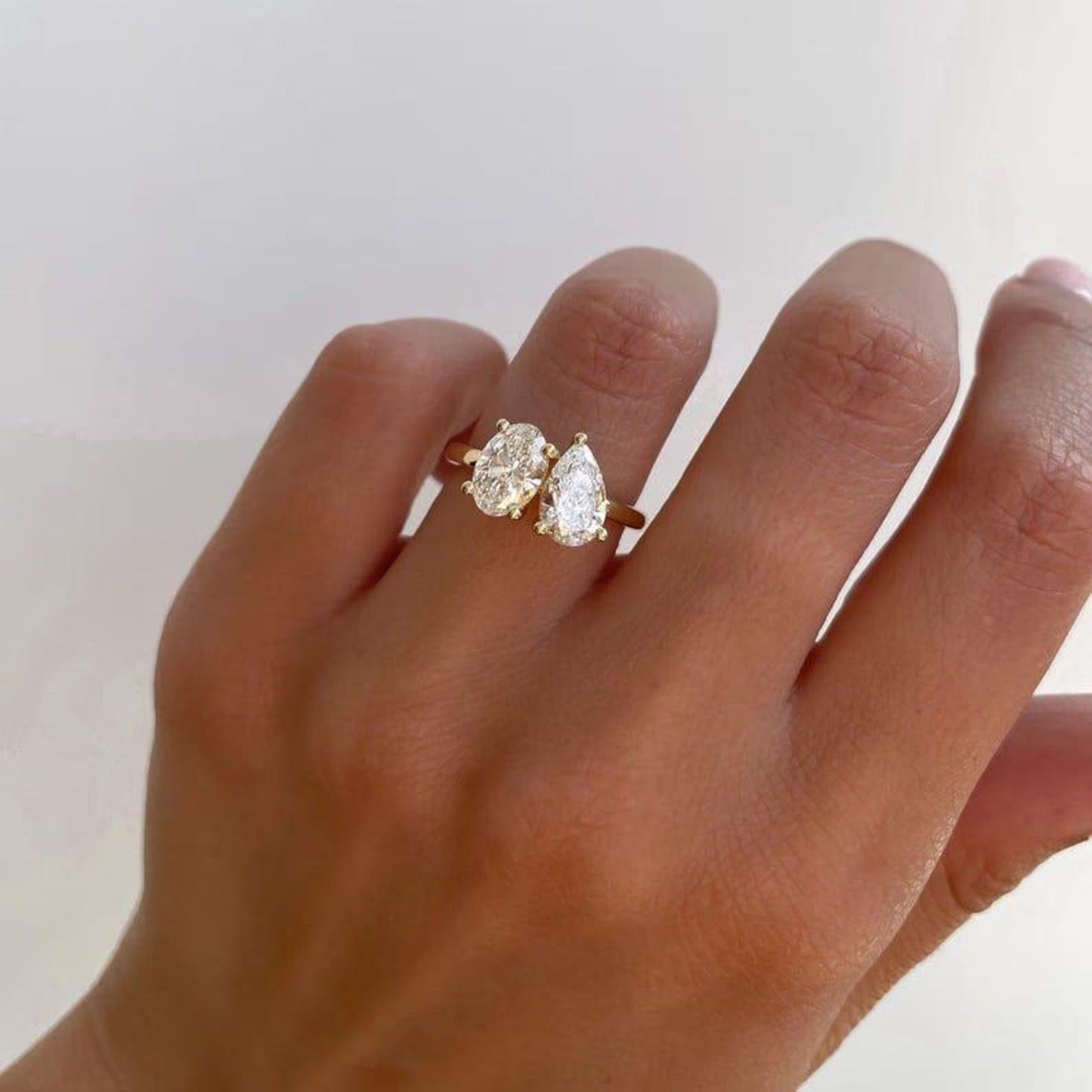 4.00 TCW oval & pear lab grown diamond IGI certified engagement ring toi et moi design luxury bridal wedding anniversary sustainable fine jewelry ring