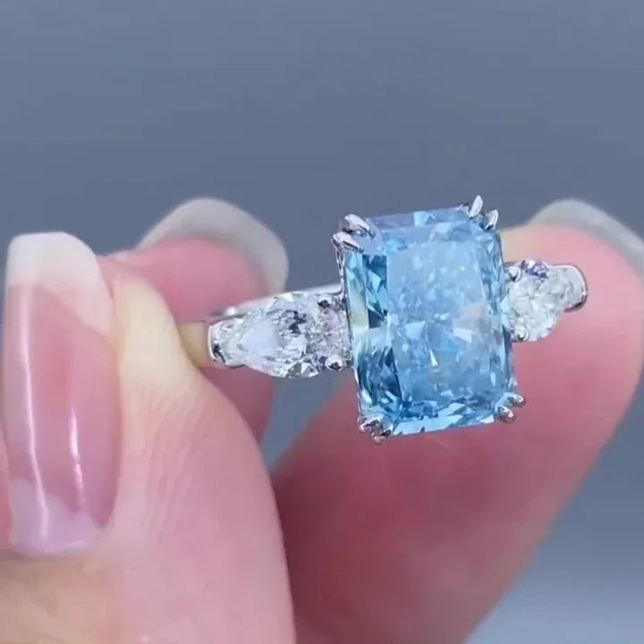4.50 TCW fancy blue radiant lab grown diamond engagement ring IGI certified pear side stone design bridal wedding ring luxury gift for her women
