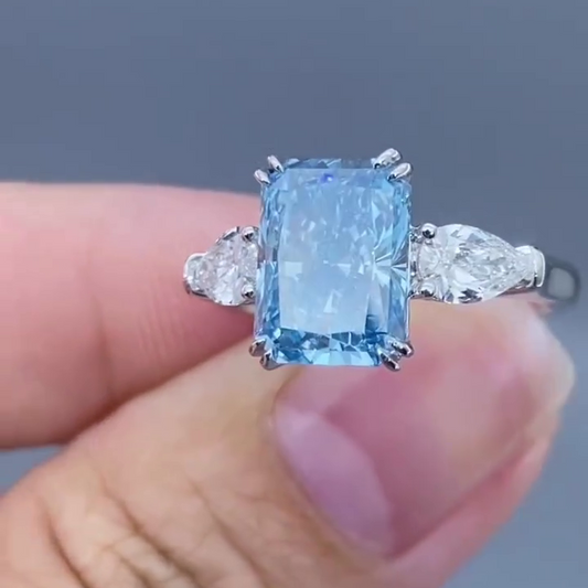 4.50 TCW Fancy Blue Radiant Lab Grown Diamond Engagement Ring | Pear Side Stone Design | IGI Certified 