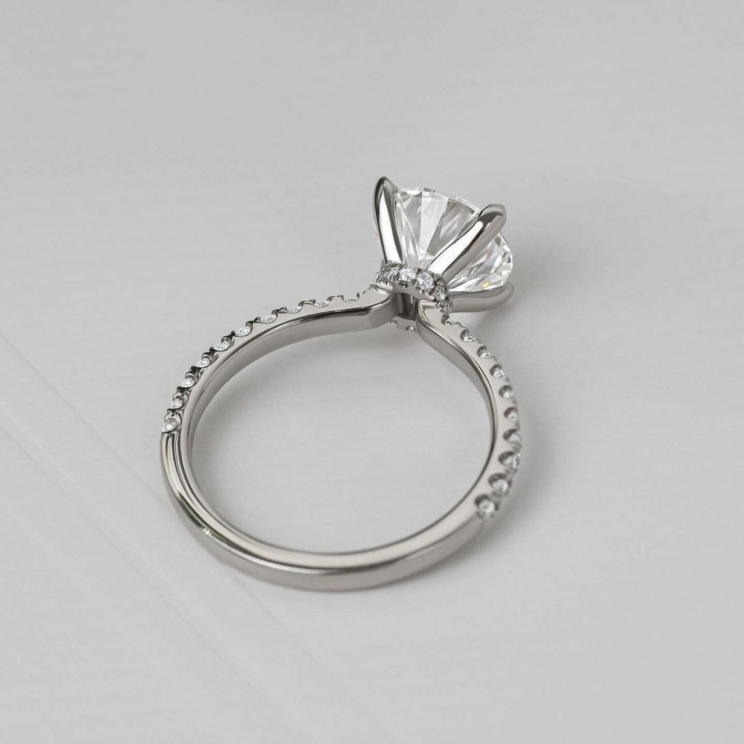 4ct Round Cut With Hidden Halo Eliana Setting Pave Band Lab Grown Diamond Ring Exquisite diamond-studded gold ring with a modern and elegant design. Luxury gold ring with sparkling diamonds, perfect for weddings or special occasions. YouTube Amazon Facebook Weather Google Gmail Wordless WhatsApp Web Translate News blog post ring ceremony Article Life Money 2025 design Ring Ceremony Diamond Shape Diamond Ring Surat Diamond India Market Diamond Ring for Her Diamond Ring for Men Diamond Ring Women Engagement 