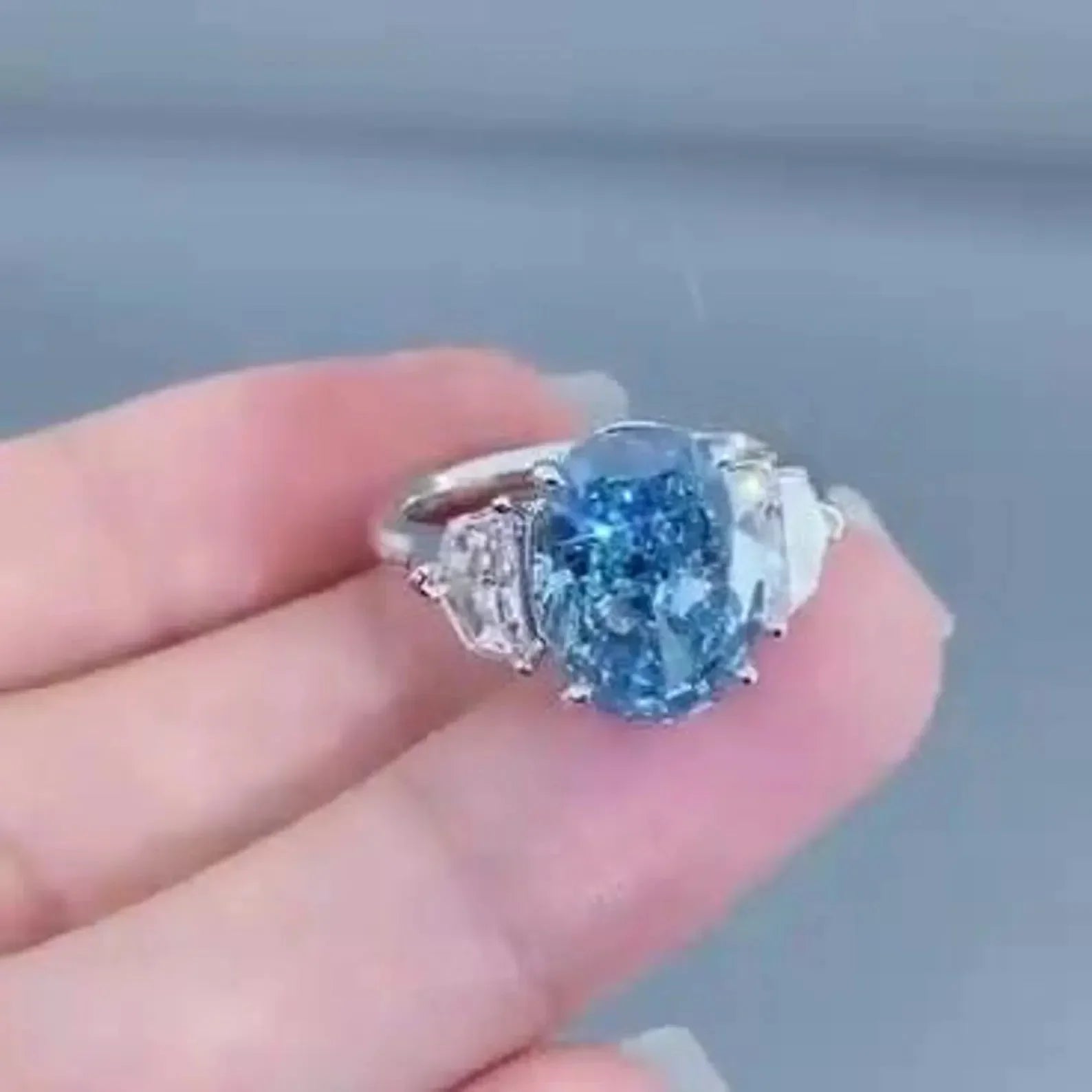 5.00 TCW IGI certified blue oval lab grown diamond ring, three stone bridal engagement ring for women