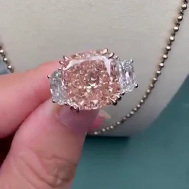 Fancy pink 7.00 TCW cushion cut lab grown diamond engagement ring IGI certified three stone statement bridal wedding ring luxury jewelry for women