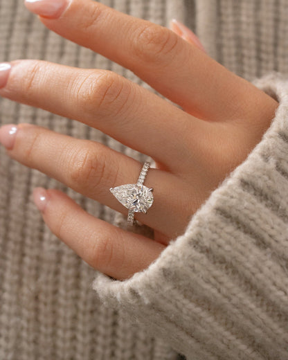 4ct Pear Cut With Pave Band Hidden Halo Lab Grown Diamond Ring This diamond ring Whether you're planning a proposal, celebrating an anniversary, or looking for the ideal wedding band, this exquisite piece of jewelry will stand out. YouTube Amazon Facebook Weather Google Gmail Wordless WhatsApp Web Translate News blog post ring ceremony Article Life Money 2025 design Ring Ceremony Diamond Shape Diamond Ring Surat Diamond India Market Diamond Ring for Her Diamond Ring for Men Diamond Ring Women Engagement 
