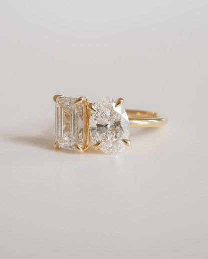 6tcw Emerald and Oval Cut Toi et Moi Lab Grown Diamond Ring diamond engagement ring with a sleek gold band, featured on a hand with a minimalist manicure. Ideal for bridal jewelry collections, luxury fashion, or romantic proposal moments. YouTube Amazon Facebook Weather Google Gmail Wordless WhatsApp Web Translate News blog post ring ceremony Article Life Money 2025 design Ring Ceremony Diamond Shape Diamond Ring Surat Diamond India Market Diamond Ring for Her Diamond Ring for Men Diamond Ring Women 