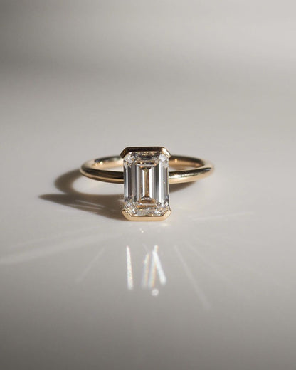 7ct Emerald Solitaire Half Bezel Lab Grown Diamond Ring Its versatile design also makes it a stunning addition to any luxury jewelry collection, modern engagement rings, premium wedding bands, or high-end diamond rings. YouTube Amazon Facebook Weather Google Gmail Wordless WhatsApp Web Translate News blog post ring ceremony Article Life Money 2025 design Ring Ceremony Diamond Shape Diamond Ring Surat Diamond India Market Diamond Ring for Her Diamond Ring for Men Diamond Ring Women Engagement Ring Finger For