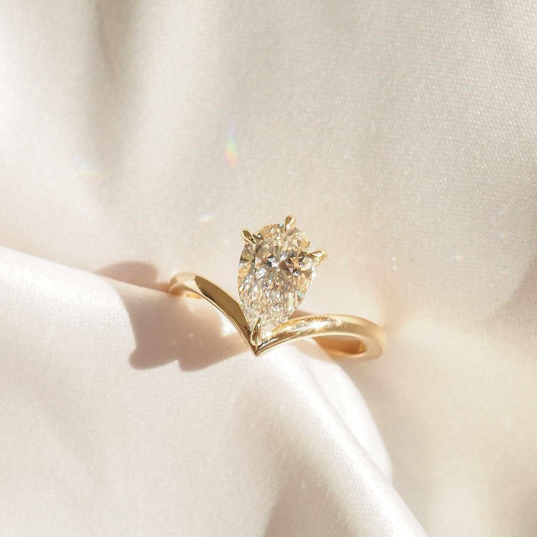 7ct Pear cut Lab grown Diamond Ring Delicate gold band featuring princess-cut diamonds, designed for refined elegance. Statement gold ring with a radiant diamond centerpiece, ideal for a bold look. YouTube Amazon Facebook Weather Google Gmail Wordless WhatsApp Web Translate News blog post ring ceremony Article Life Money 2025 design Ring Ceremony Diamond Shape Diamond Ring Surat Diamond India Market Diamond Ring for Her Diamond Ring for Men Diamond Ring Women Engagement Ring Finger For Her Finger Ring Gold 