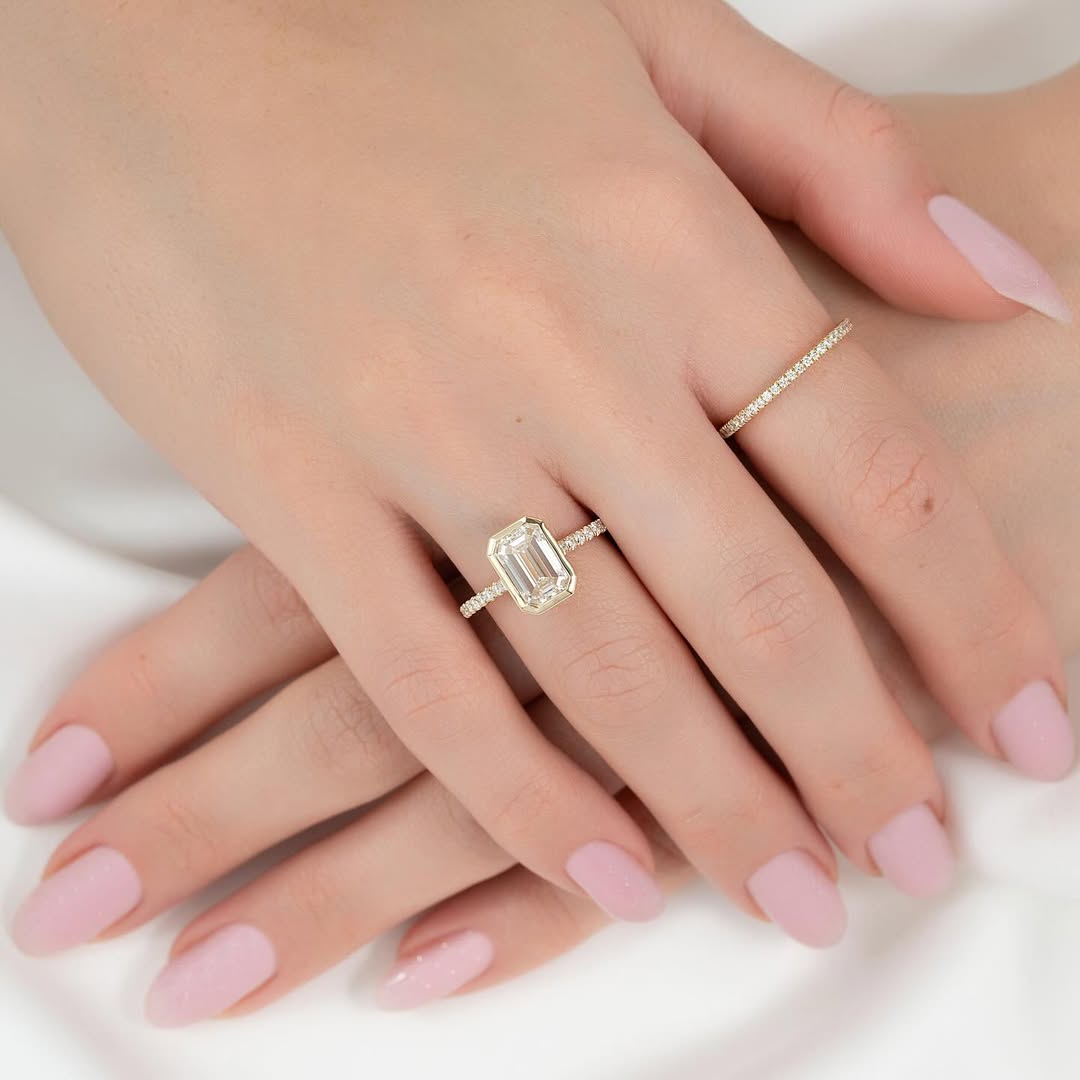 2.0ct Emerald Cut Lab Grown Diamond Solitaire Full Bezel Ring With Pave Band & Hidden Halo