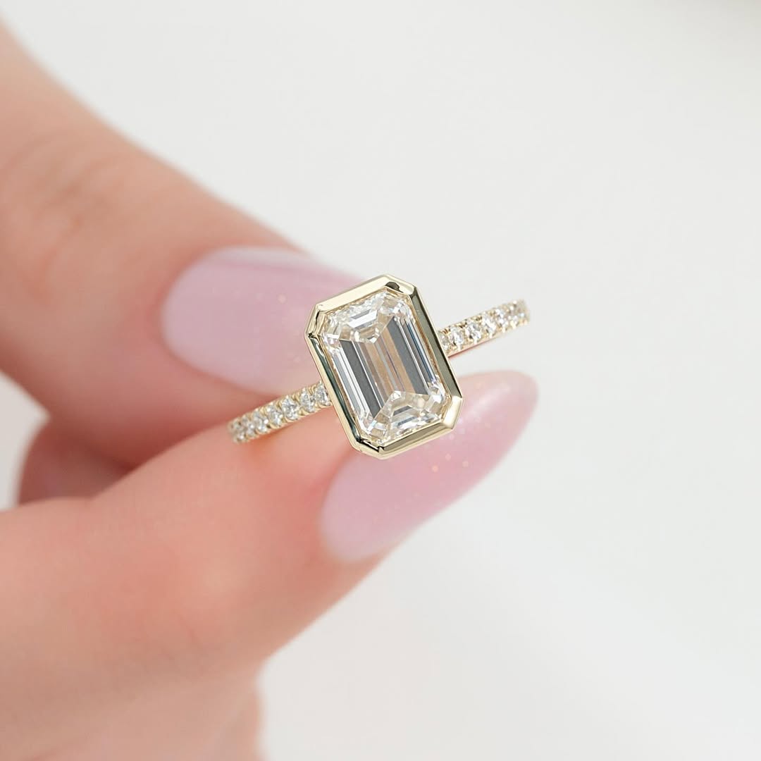 2.0ct Emerald Cut Lab Grown Diamond Solitaire Full Bezel Ring With Pave Band & Hidden Halo