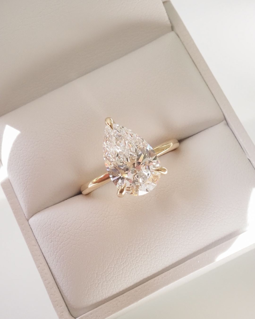 4.5ct Pear Solitaire Three Claw Lab Grown Diamond Ring Radiant gold ring with an oval-cut diamond centerpiece, exuding sophistication. Gold infinity ring adorned with shimmering diamonds, perfect for anniversaries or milestones. YouTube Amazon Facebook Weather Google Gmail Wordless WhatsApp Web Translate News blog post ring ceremony Article Life Money 2025 design Ring Ceremony Diamond Shape Diamond Ring Surat Diamond India Market Diamond Ring for Her Diamond Ring for Men Diamond Ring Women Engagement Ring 