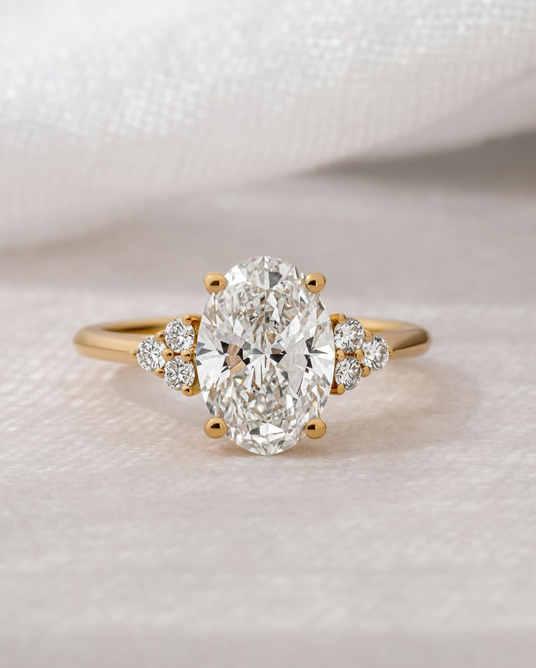 5ct Oval Cut Center Lab Grown Diamond With Two Side tiny Round Cut Lab Grown Diamond Premium diamond gold ring, crafted with intricate details and a refined finish. Classic gold band enhanced with shimmering diamonds, suitable for all occasions. YouTube Amazon Facebook Weather Google Gmail Wordless WhatsApp Web Translate News blog post ring ceremony Article Life Money 2025 design Ring Ceremony Diamond Shape Diamond Ring Surat Diamond India Market Diamond Ring for Her Diamond Ring for Men Diamond Ring Women 