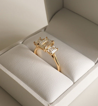 4.5ct Emerald Three Stone Lab Grown Diamond Ring  Designed to dazzle, the diamond’s brilliance makes it an ideal choice for engagements, weddings, anniversaries, or any special occasion. YouTube Amazon Facebook Weather Google Gmail Wordless WhatsApp Web Translate News blog post ring ceremony Article Life Money 2025 design Ring Ceremony Diamond Shape Diamond Ring Surat Diamond India Market Diamond Ring for Her Diamond Ring for Men Diamond Ring Women Engagement Ring Finger For Her Finger Ring Gold Ring Blue  