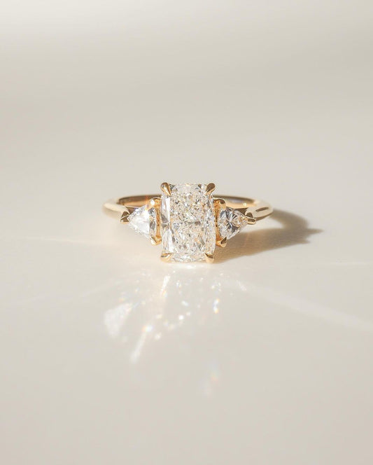 7ct Cushion Cut Lab Grown Diamond Trio Ring With Center Stone With Pear Side Stones Luxury Diamond Ring on a Sleek Gold Band – Perfect for Engagements, Weddings, and Special Occasions YouTube Amazon Facebook Weather Google Gmail Wordless WhatsApp Web Translate News blog post ring ceremony Article Life Money 2025 design Ring Ceremony Diamond Shape Diamond Ring Surat Diamond India Market Diamond Ring for Her Diamond Ring for Men Diamond Ring Women Engagement Ring Finger For Her Finger Ring Gold Ring Bluestone