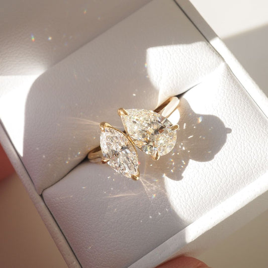 5tcw Pear and marquise Double Lab Grown Diamond Ring Designer gold ring set with high-quality diamonds, perfect for gifting.  Beautifully crafted diamond and gold ring, blending tradition with contemporary style. YouTube Amazon Facebook Weather Google Gmail Wordless WhatsApp Web Translate News blog post ring ceremony Article Life Money 2025 design Ring Ceremony Diamond Shape Diamond Ring Surat Diamond India Market Diamond Ring for Her Diamond Ring for Men Diamond Ring Women Engagement Ring Finger For Her 