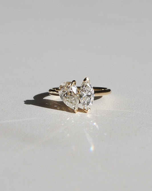 4tcw Pear & Marquise Toi Et Moi Lab Grown Diamond Ring Minimalist  diamond ring on a gold band, symbolizing timeless elegance, showcased on a naturally manicured hand. diamond ring, gold engagement ring, luxury bridal jewelry  and anniversary diamond ring YouTube Amazon Facebook Weather Google Gmail Wordless WhatsApp Web Translate News blog post ring ceremony Article Life Money 2025 design Ring Ceremony Diamond Shape Diamond Ring Surat Diamond India Market Diamond Ring for Her Diamond Ring for Men Diamond 