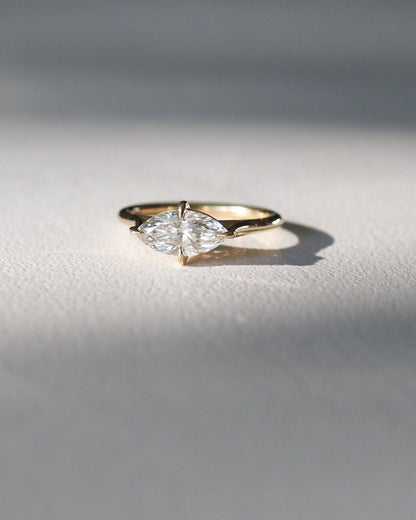1.5ct Marquise Solitaire Lab Grown Diamond Ring Modern  diamond solitaire ring on a gold band, styled with a natural manicure. A perfect symbol of love for engagements, proposals, weddings, or premium jewelry collections. YouTube Amazon Facebook Weather Google Gmail Wordless WhatsApp Web Translate News blog post ring ceremony Article Life Money 2025 design Ring Ceremony Diamond Shape Diamond Ring Surat Diamond India Market