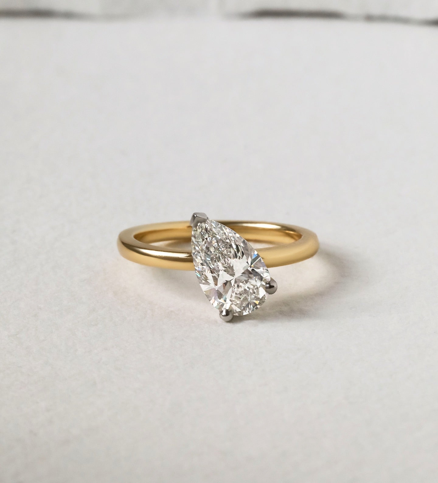 5ct Pear Cut Solitaire East West Setting Lab Grown Diamond Ring Stunning diamond solitaire ring on a gold band, ideal for engagements, weddings, or fine jewelry collections.   YouTube Amazon Facebook Weather Google Gmail Wordless WhatsApp Web Translate News blog post ring ceremony Article Life Money 2025 design Ring Ceremony Diamond Shape Diamond Ring Surat Diamond India Market Diamond Ring for Her Diamond Ring for Men Diamond Ring Women Engagement Ring Finger For Her Finger Ring Gold Ring Bluestone Ring 