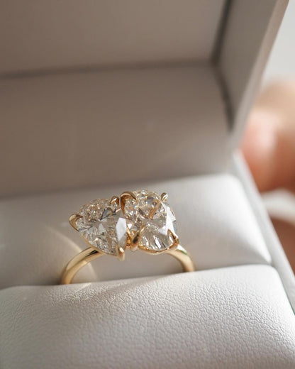 5tcw Oval & Pear Cut Toi Et Moi Lab Grown Diamond Ring Showcasing the beauty of making it perfect for bridal shoots, or jewelry promotions. Diamond engagement ring, bridal jewelry, luxury fashion, proposal moments, gold band. YouTube Amazon Facebook Weather Google Gmail Wordless WhatsApp Web Translate News blog post ring ceremony Article Life Money 2025 design Ring Ceremony Diamond Shape Diamond Ring Surat Diamond India Market Diamond Ring for Her Diamond Ring for Men Diamond Ring Women Engagement Ring 
