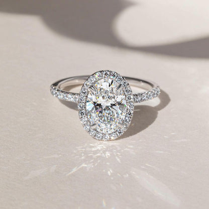 2.5ct Oval Cut With Hidden Halo Eliana Setting Pave Band Lab Grown Diamond Ring  Luxurious diamond engagement ring on a gold band, elegantly showcased on a well-manicured hand for wedding and proposal inspiration. YouTube Amazon Facebook Weather Google Gmail Wordless WhatsApp Web Translate News blog post ring ceremony Article Life Money 2025 design Ring Ceremony Diamond Shape Diamond Ring Surat Diamond India Market Diamond Ring for Her Diamond Ring for Men Diamond Ring Women Engagement Ring Finger For Her 