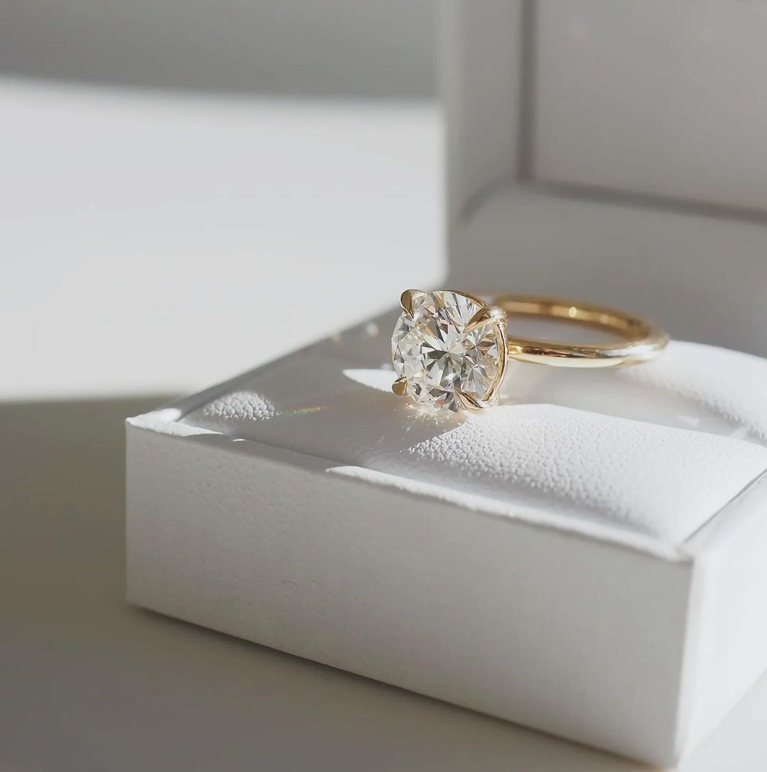 2ct Round Solitaire Lab Grown Diamond Ring The sleek gold band enhances its modern yet classic appeal, offering a perfect balance of luxury and refinement. diamond ring, gold engagement ring, luxury bridal jewelry, wedding accessories,  YouTube Amazon Facebook Weather Google Gmail Wordless WhatsApp Web Translate News blog post ring ceremony Article Life Money 2025 design Ring Ceremony Diamond Shape Diamond Ring Surat Diamond India Market Diamond Ring for Her Diamond Ring for Men Diamond Ring Women Engagemen