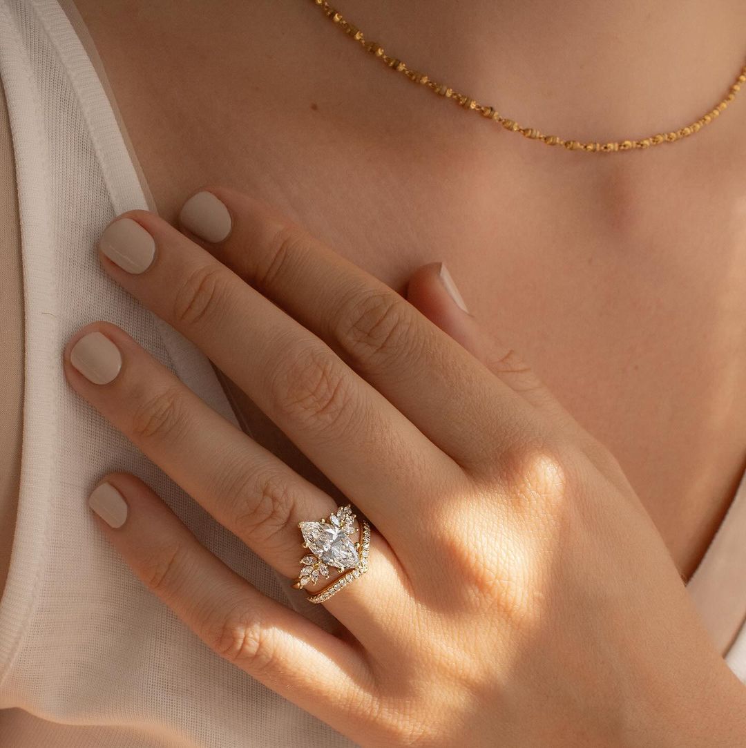 4.5ct Marquise Diamond With Anastasia Setting Lab grown Diamond Ring Showcasing the beauty of making it perfect for bridal shoots, or jewelry promotions. Diamond engagement ring, bridal jewelry, luxury fashion, proposal moments, gold band. YouTube Amazon Facebook Weather Google Gmail Wordless WhatsApp Web Translate News blog post ring ceremony Article Life Money 2025 design Ring Ceremony Diamond Shape Diamond Ring Surat Diamond India Market Diamond Ring for Her Diamond Ring for Men Diamond Ring Women 