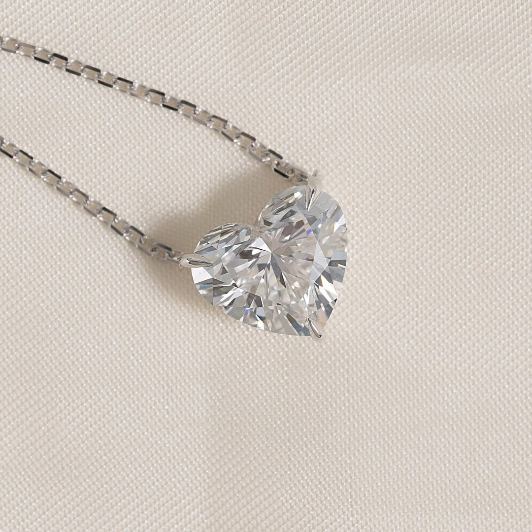 pendant set with a 3 carat Heart cut diamond in white gold