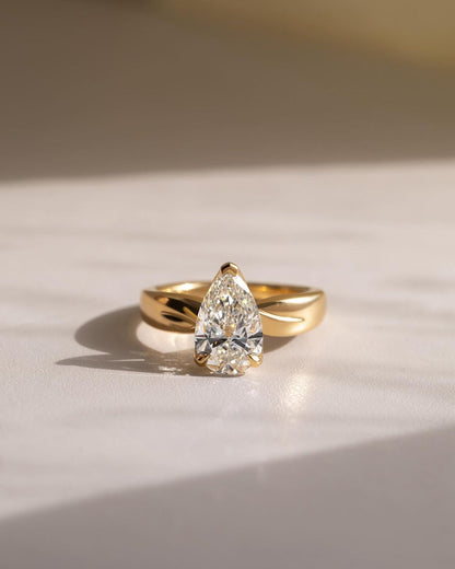 1.5ct Pear Cut Three Claw Lab Grown Diamond Ring this ring becomes the centerpiece of elegance, making it ideal for bridal photos, luxury fashion shoots, or gift guides. It's a favorite among those seeking meaningful, timeless pieces  YouTube Amazon Facebook Weather Google Gmail Wordless WhatsApp Web Translate News blog post ring ceremony Article Life Money 2025 design Ring Ceremony Diamond Shape Diamond Ring Surat Diamond India Market Diamond Ring for Her Diamond Ring for Men Diamond Ring Women Engagement 