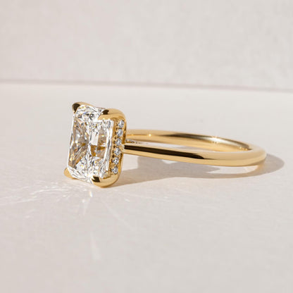 7ct Radiant Cut Juliette Setting with Hidden Halo Lab grown Diamond Ring  The hand displays a soft, natural manicure, highlighting the diamond's brilliance and the ring's refined craftsmanship. Ideal for those seeking timeless, high-end accessories for special occasions. YouTube Amazon Facebook Weather Google Gmail Wordless WhatsApp Web Translate News blog post ring ceremony Article Life Money 2025 design Ring Ceremony Diamond Shape Diamond Ring Surat Diamond India Market Diamond Ring for Her Diamond Ring 