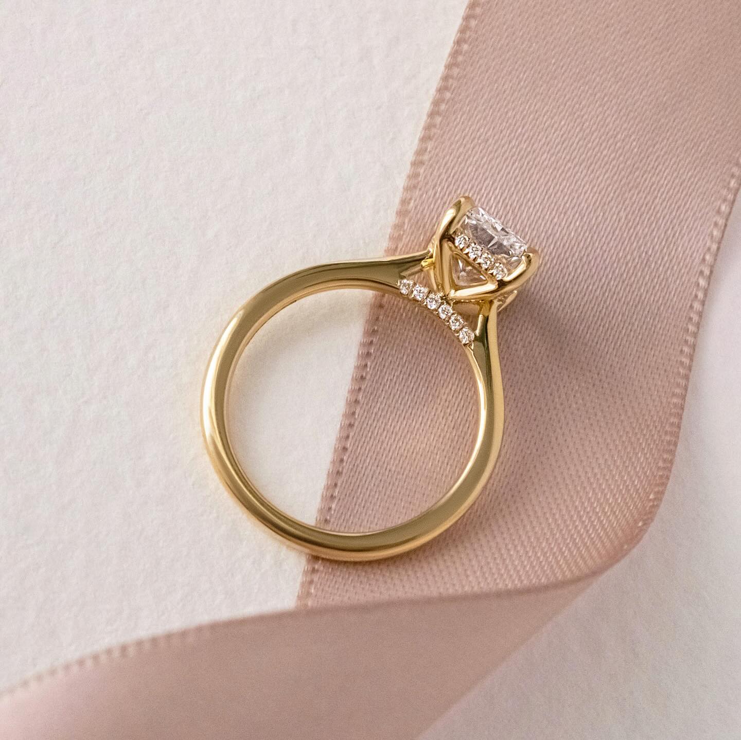 7ct Radiant Cut Juliette Setting with Hidden Halo Lab grown Diamond Ring Close-up of an exquisite gold-band ring featuring a diamond, ideal for engagement celebrations or luxury jewelry enthusiasts. The soft manicure enhances the refined and elegant appeal. YouTube Amazon Facebook Weather Google Gmail Wordless WhatsApp Web Translate News blog post ring ceremony Article Life Money 2025 design Ring Ceremony Diamond Shape Diamond Ring Surat Diamond India Market Diamond Ring for Her Diamond Ring for Men Diamond