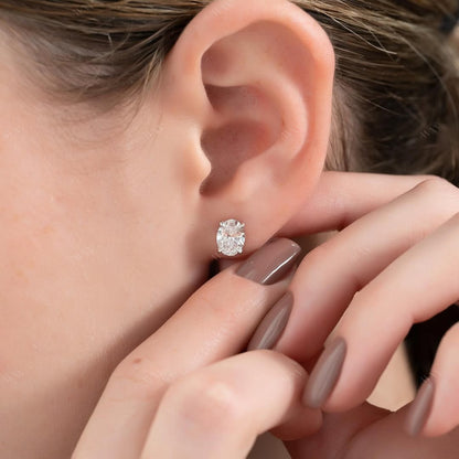 Stud Earrings set with 2 carat Oval cut diamonds in white gold