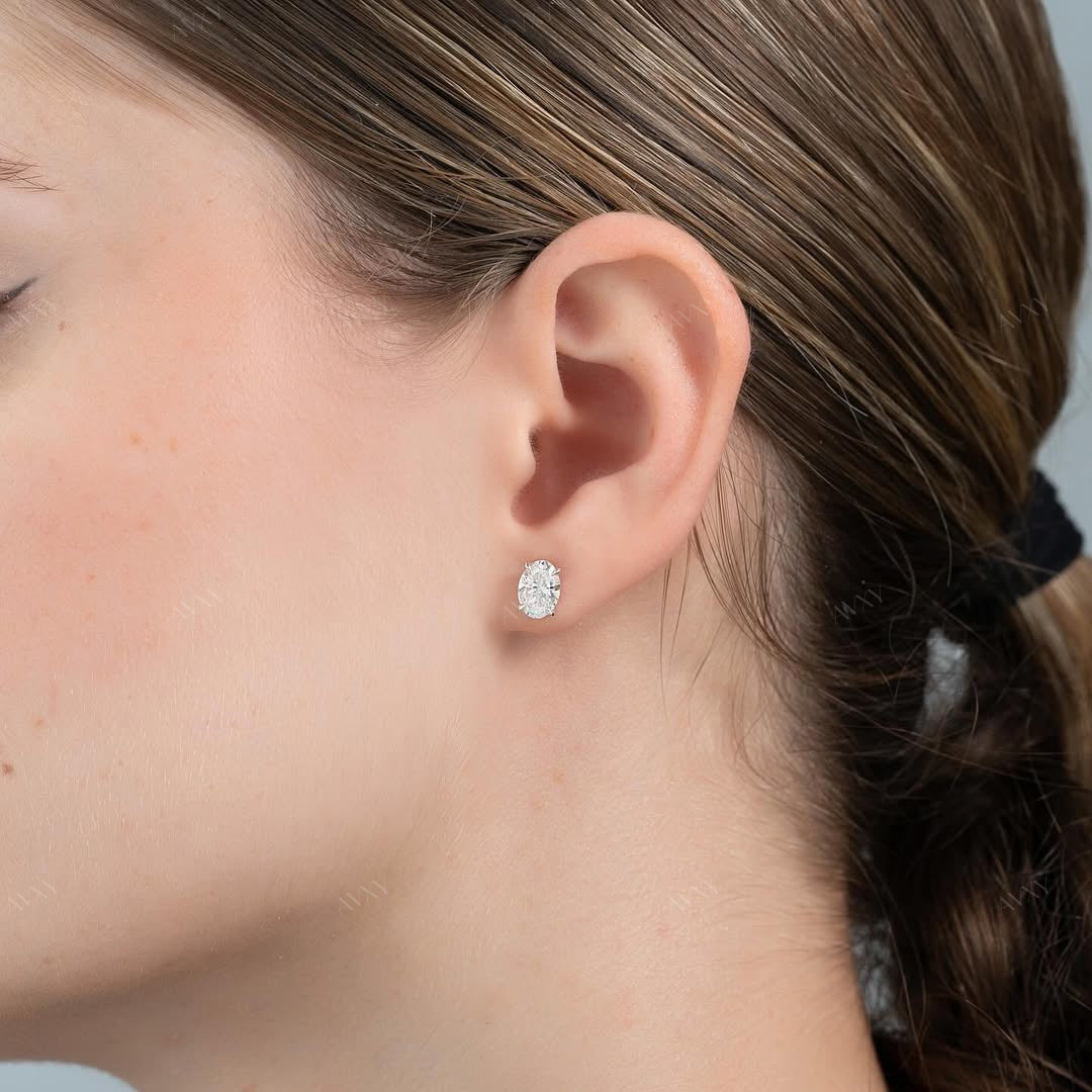 Stud Earrings set with 2 carat Oval cut diamonds in white gold