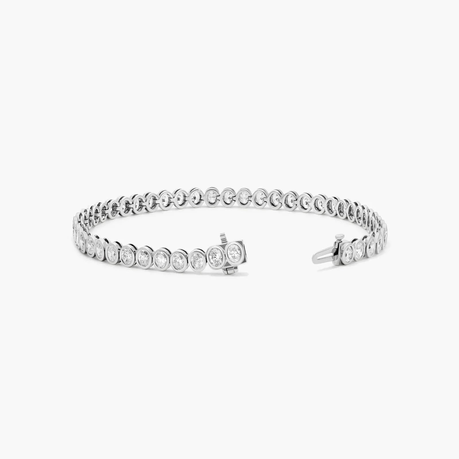 Oval Lab Grown diamond Bezel Tennis Bracelet, EF Color, VS Clarity, IGI Certified 4.56tcw 