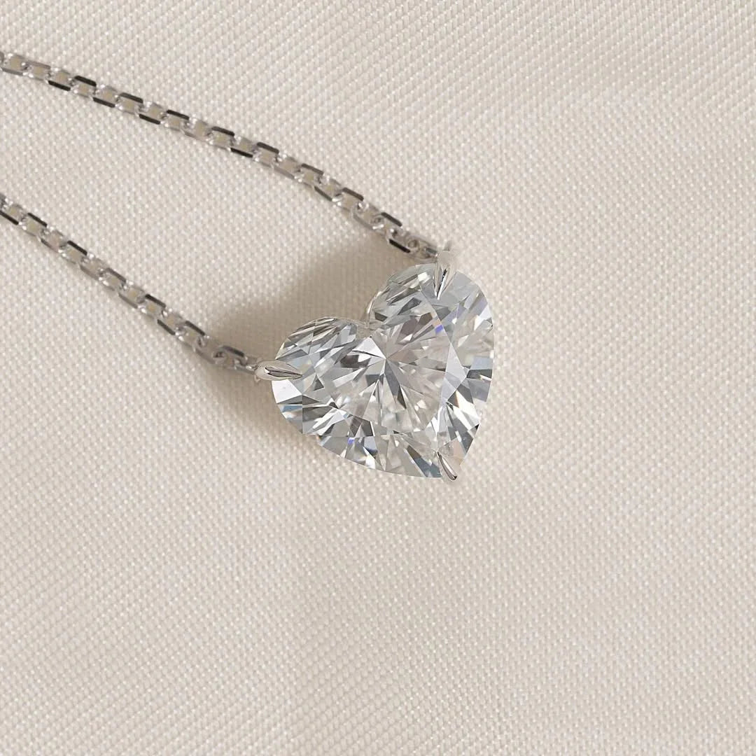 pendant set with a 3 carat Heart cut diamond in white gold 