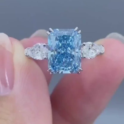 4.00 CT Fancy Blue Radiant Lab Grown Diamond Engagement Ring | Pear Side Stone Design | IGI Certified