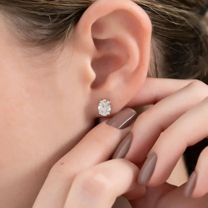 Stud Earrings set with 2 carat Oval cut diamonds in white gold 